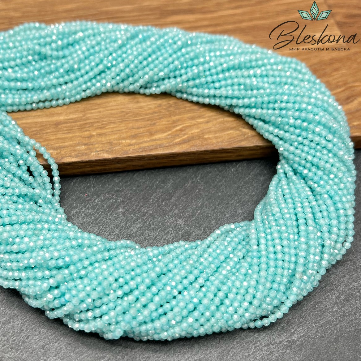 Циркон Glow светло-бирюзовый огранка 2 мм (кубический цирконий, фианит) 