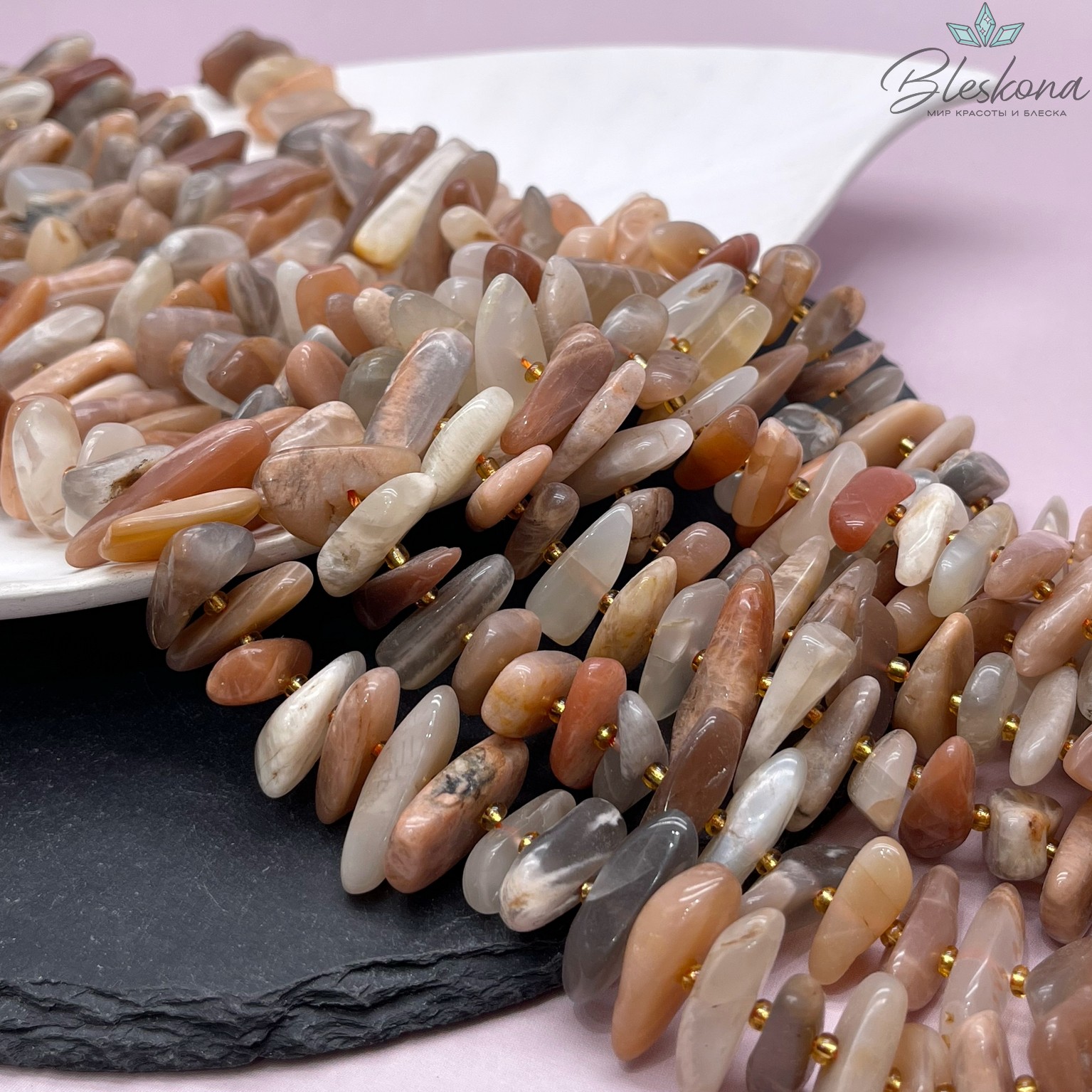 Солнечный камень сколы шлифованные 17-27 мм