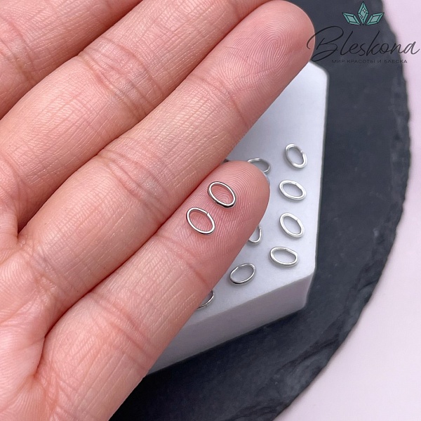 5,5*3,7*1,3 мм Цвет серебро, Колечки овал уп. 1 гр.