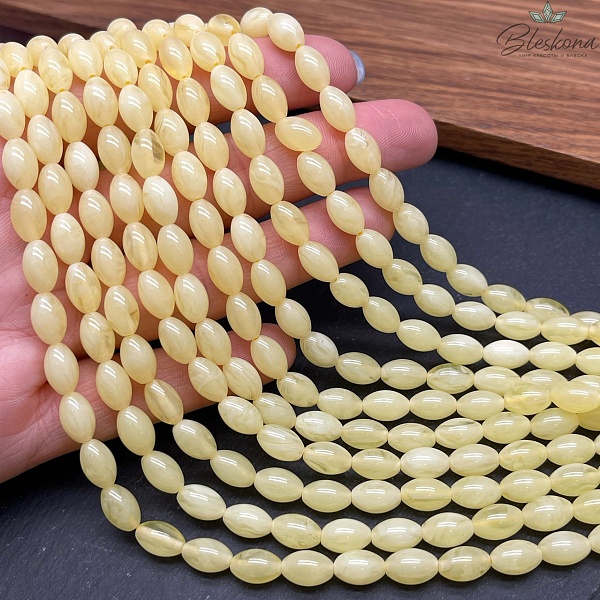 Янтарь светло- желтый рис 9*6 мм