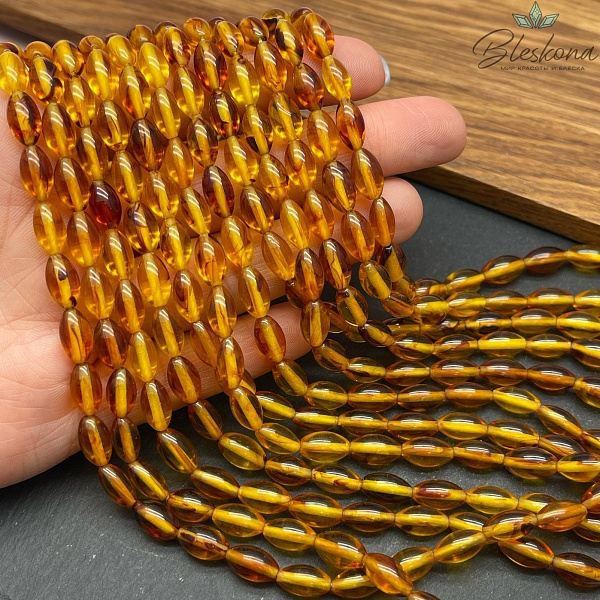 Янтарь светло-коричневый рис 10*6 мм